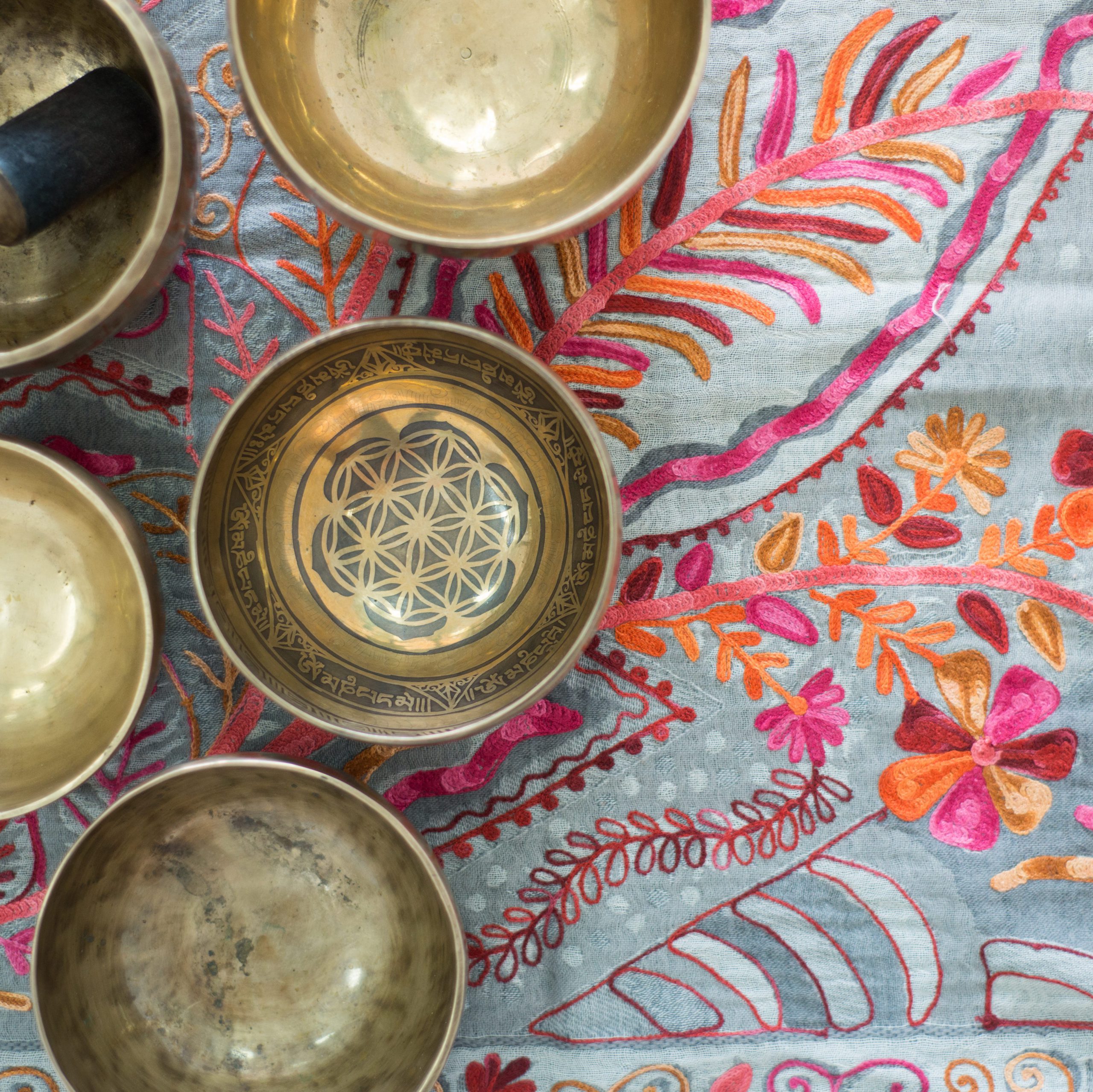 Singing Bowls on a Colourful Cloth